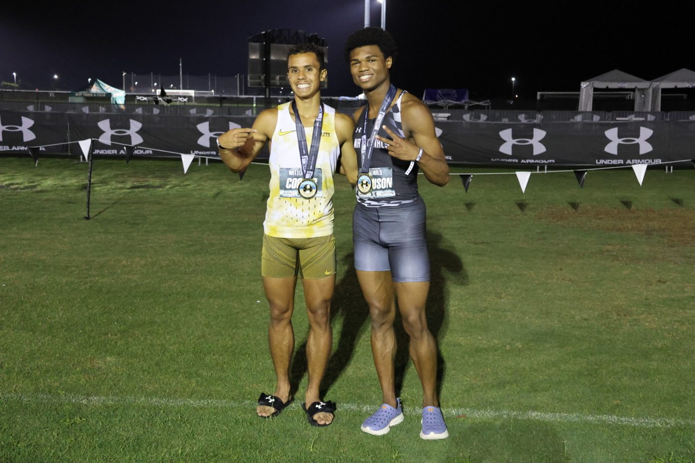 Class of 2027 juniors Nicholas L. Ferguson and Joshua Cooper with their medals after both ran personal-best 800m times at the 2026 Under Armour Nationals