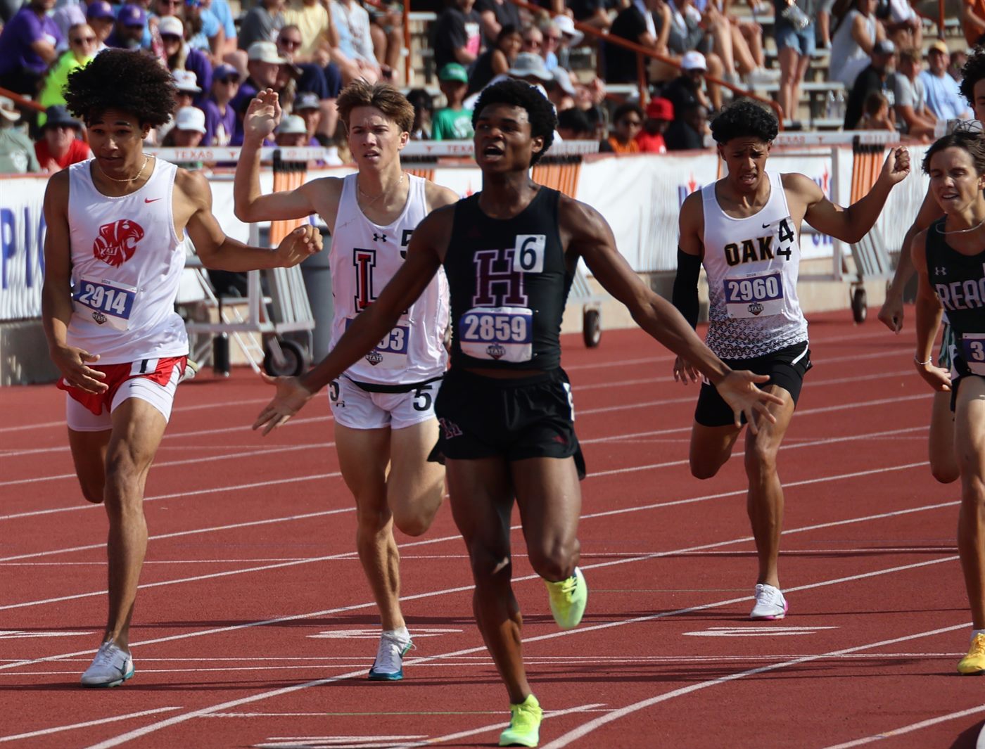 Nicholas L. Ferguson of Houston Heights crossing the finish line first to win the 2026 UIL Texas 6A Boys 800m State Championship at Mike A. Myers Stadium