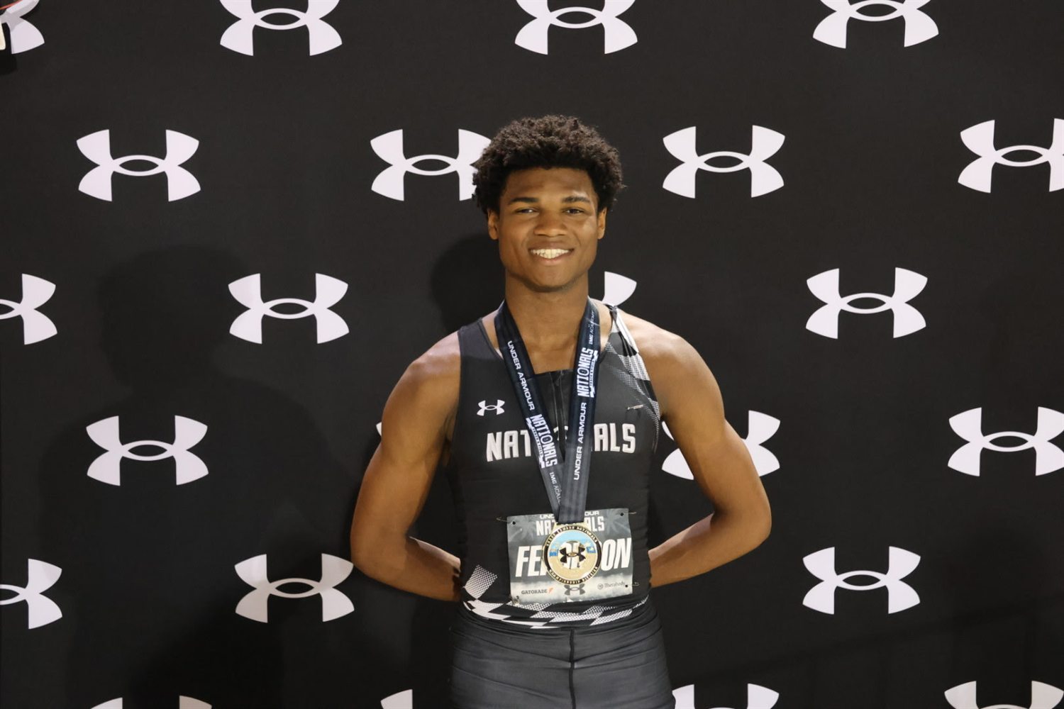 Nicholas L. Ferguson of Houston Heights wearing his All-American medal at the 2026 Under Armour Track & Field Nationals after finishing 2nd in the boys 800m